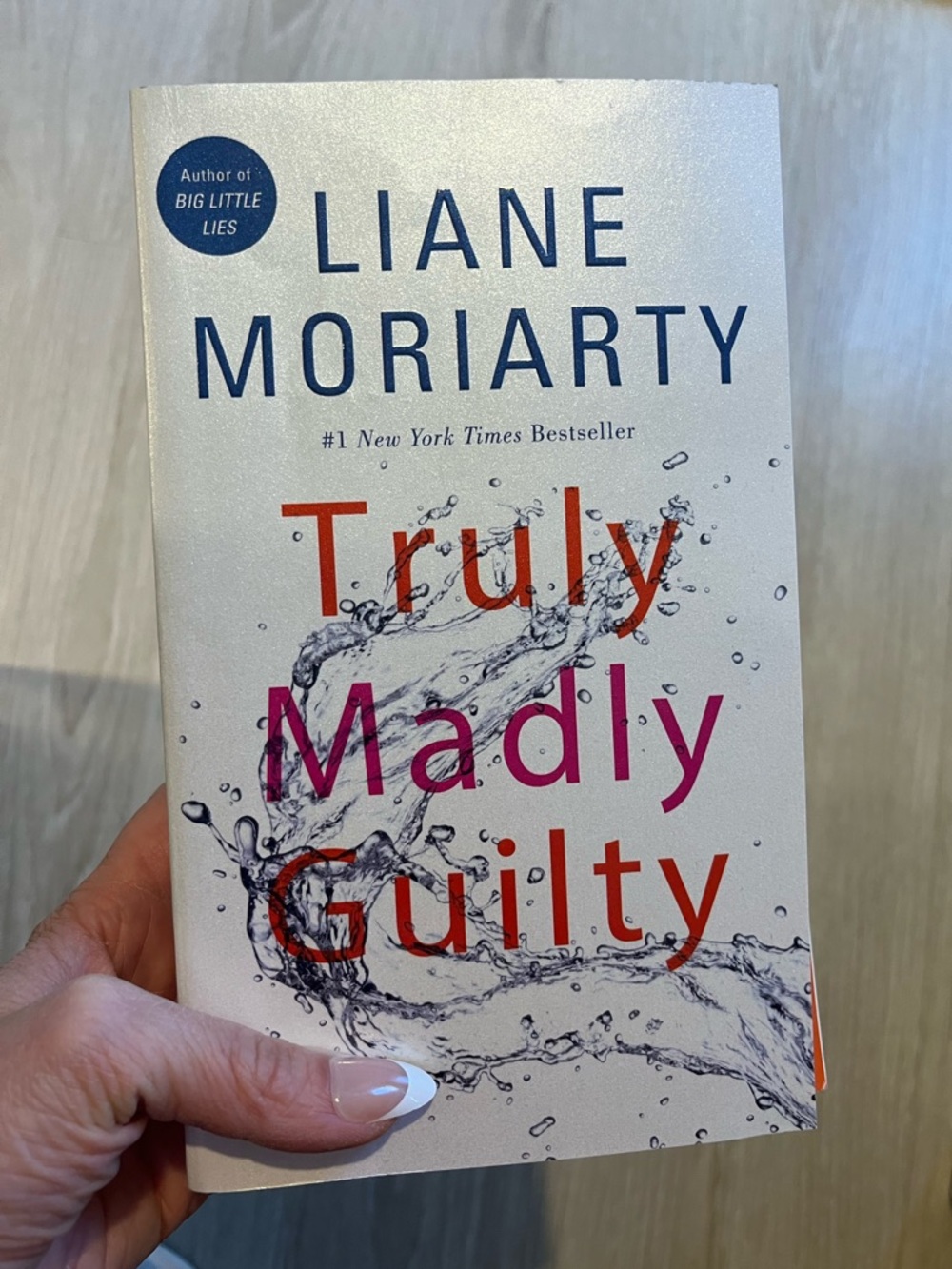 Liane Moriarty "Truly Madly Guilty" - White Cover with Multicolor Text